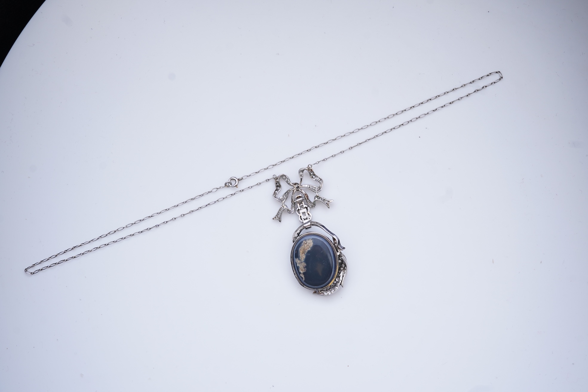 An impressive Belle Epoque black opal and diamond pendant, early 20th century